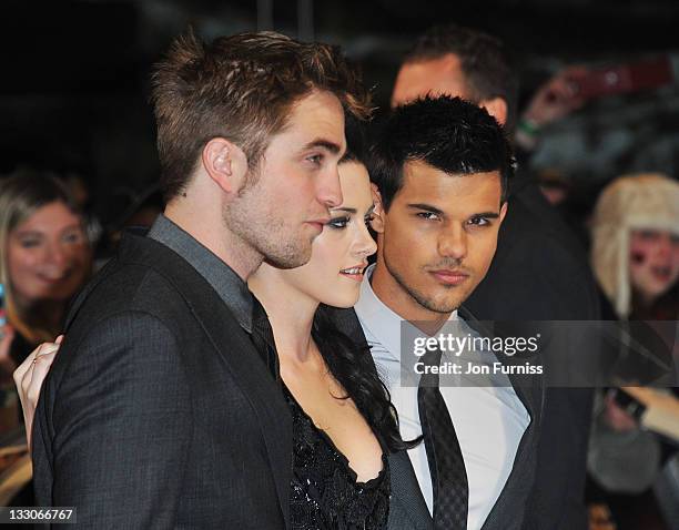 Actors Robert Pattinson, Kristen Stewart and Taylor Lautner attend 'The Twilight Saga: Breaking Dawn Part 1' UK Premiere, at Westfield Stratford City...