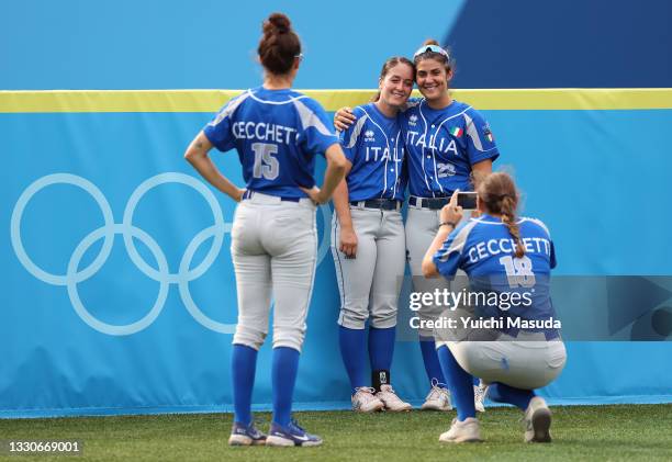 Ilaria Cacciamani and Beatrice Ricchi of Team Italy pose for a photo taken by Greta Cecchetti after their game against Team Canada during softball...