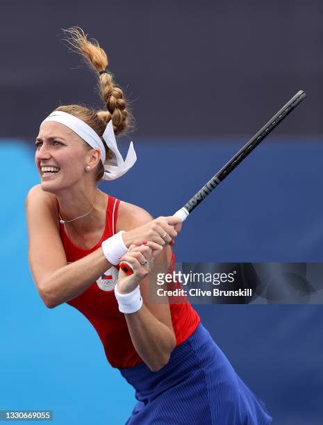 Petra Kvitova of Team Czech Republic plays a backhand during her Women's Singles Second Round match against Alison Van Uytvanck of Team Belarus on...