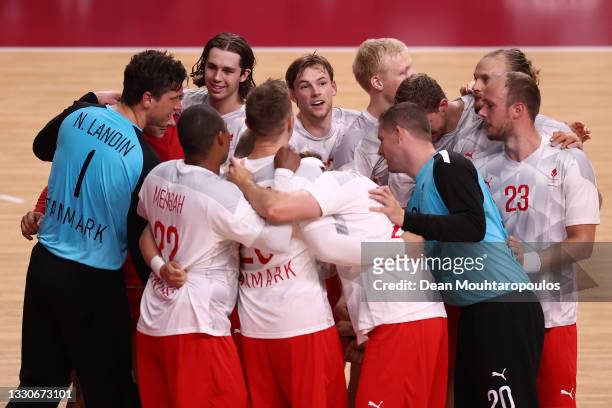 Team Denmark celebrate after winning the Men's Preliminary Round Group B match between Egypt and Denmark on day three of the Tokyo 2020 Olympic Games...