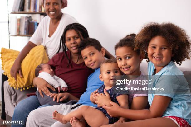 happy same-sex family with five children. - family with five children stock pictures, royalty-free photos & images
