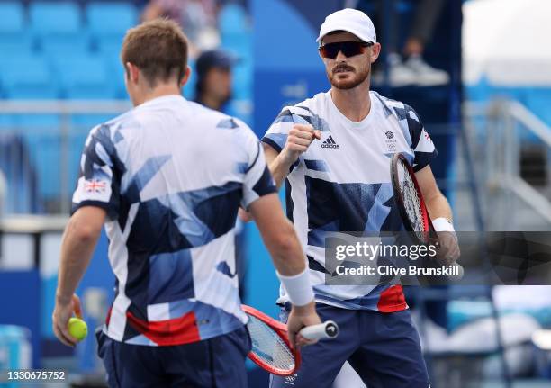 Jamie Murray of Team Great Britain and Neal Skupski of Team Great Britain play Kei Nishikori of Team Japan and Ben McLachlan of Team Japan in their...