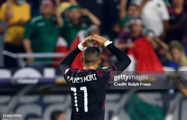 Rogelio Funes Mori of Mexico gestures to the crowd after scoring a goal against Honduras during the first half of the Concacaf Gold Cup quarterfinal...