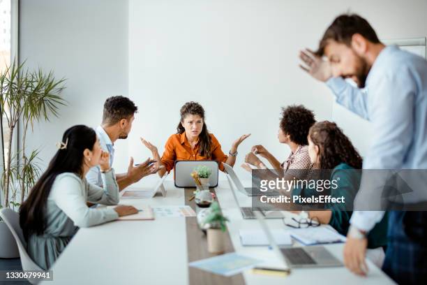 problems on a business meeting - resolve conflict stock pictures, royalty-free photos & images