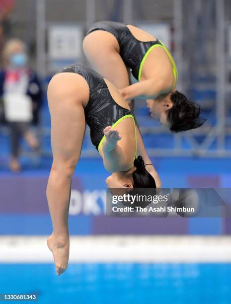 Hazuki Miyamoto and Haruka Enomoto of Team Japan compete in the Women's Synchronised 3m Springboard Final on day two of the Tokyo 2020 Olympic Games...