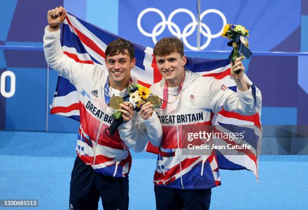 Gold Medalists Tom Daley of Team Great Britain during the medals ceremony of the Men's Synchronised 10m Platform Final on day three of the Tokyo 2020...