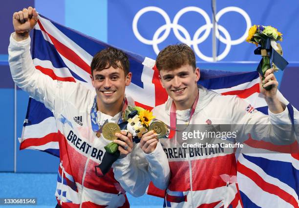 Gold Medalists Tom Daley of Team Great Britain during the medals ceremony of the Men's Synchronised 10m Platform Final on day three of the Tokyo 2020...