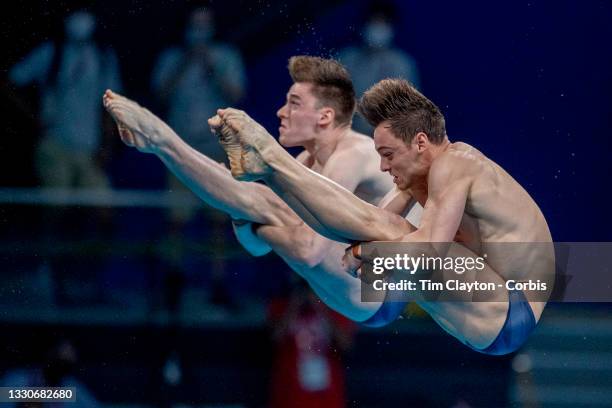 Tom Daley and Matty Lee of Great Britain during their gold medal performance in the Synchronised 10m Platform Diving for Men at the Tokyo Aquatic...