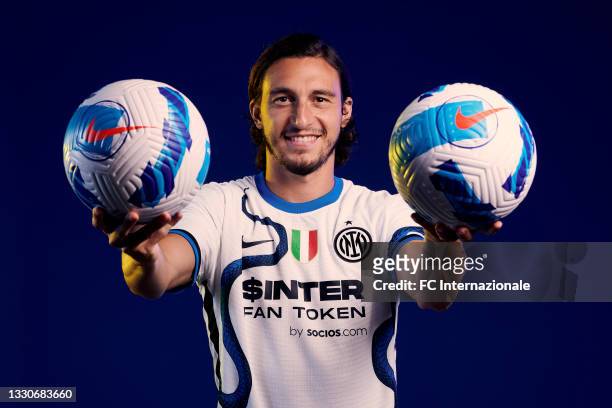 Darmian Matteo of FC Internazionale poses for a portrait with the new away kit with the main sponsor socios.com at Appiano Gentile on July 26, 2021...