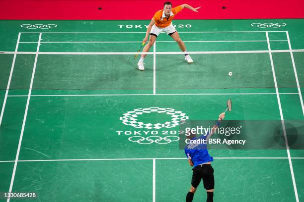 Misha Zilberman of Israel and Mark Caljouw of the Netherlands competing on Men's Singles Group Play Stage - Group D during the Tokyo 2020 Olympic...