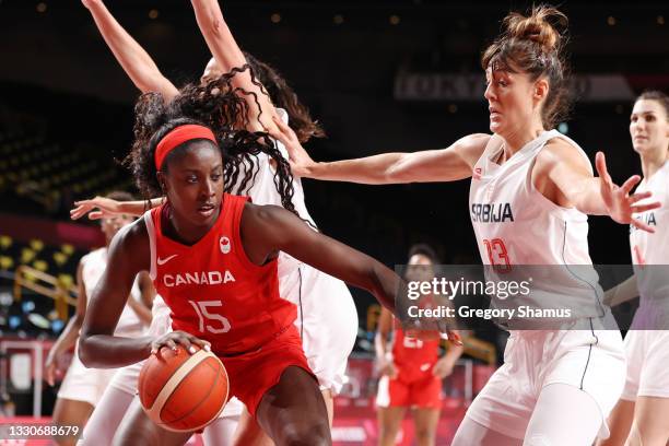 Laeticia Amihere of Team Canada drives baseline against Tina Krajisnik of Team Serbia during the second half of the Women's Preliminary Round Group A...