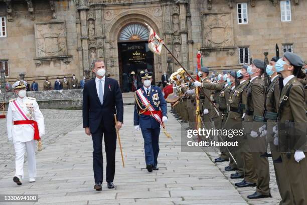 This handout image provided by the Spanish Royal Household shows King Felipe of Spain arriving at the national offering to the apostle Santiago on...