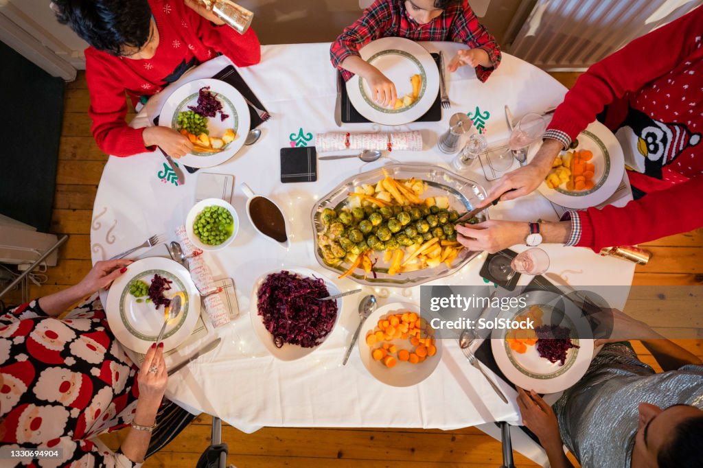 Family Serving Vegan Christmas Lunch