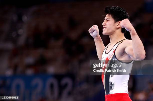 Daiki Hashimoto of Team Japan reacts after competing on pommel horse during the Men's Team Final on day three of the Tokyo 2020 Olympic Games at...