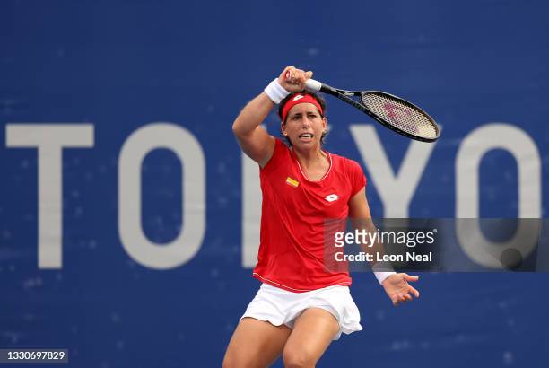 Carla Suarez Navarro of Team Spain plays a forehand during her Women's Singles Second Round match against Karolina Pliskova of Team Czech Republic on...