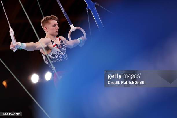 Shane Wiskus of Team United States competes on rings during the Men's Team Final on day three of the Tokyo 2020 Olympic Games at Ariake Gymnastics...