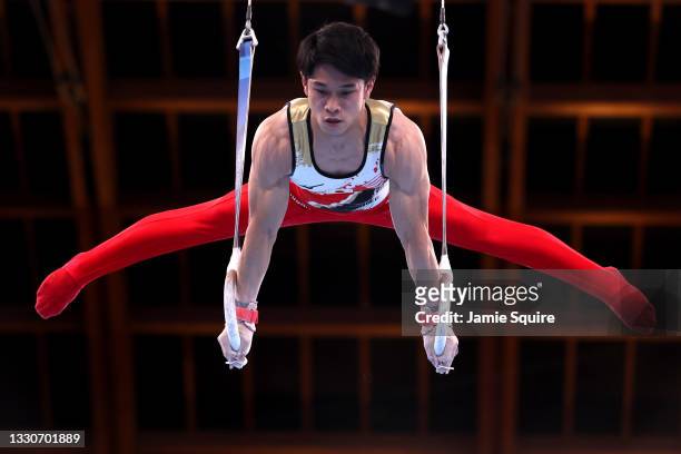 Wataru Tanigawa of Team Japan competes on rings during the Men's Team Final on day three of the Tokyo 2020 Olympic Games at Ariake Gymnastics Centre...