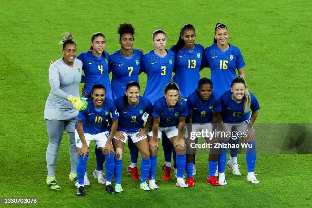 Players of Brazil line up during the Women's First Round Group F match on day one of the Tokyo 2020 Olympic Games at Miyagi Stadium on July 24, 2021...