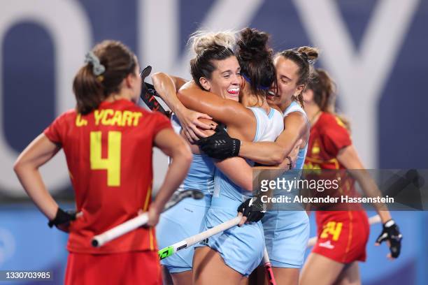 Agustina Albertarrio of Team Argentina celebrates with teammates after scoring their team's second goal during the Women's Preliminary Pool B match...