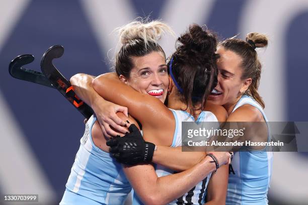 Agustina Albertarrio of Team Argentina celebrates with teammates after scoring their team's second goal during the Women's Preliminary Pool B match...