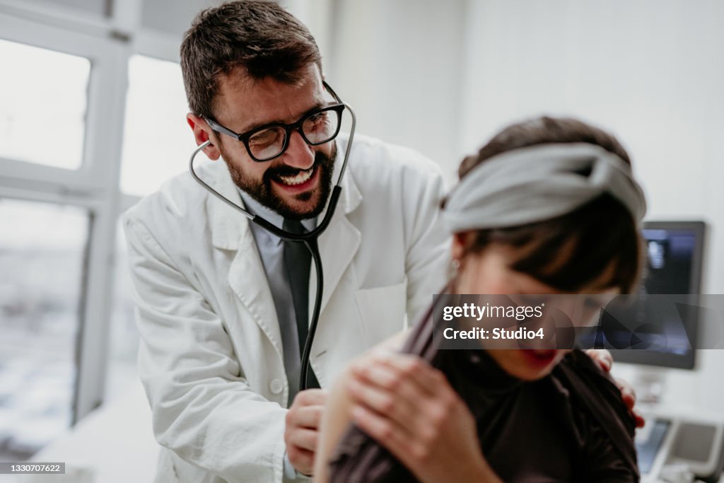 Using Dr. Check Regular Checkups At The Doctor High-Res Stock Photo - Getty Images