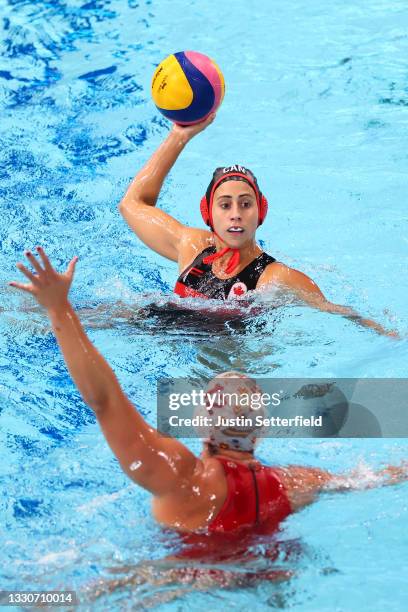 Joelle Bekhazi of Team Canada looks for a way past Paula Leiton Arrones of Team Spain during the Women's Preliminary Round Group A match between...