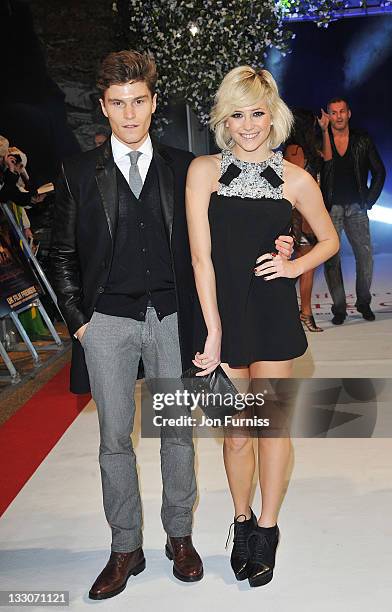 Singer Pixie Lott and Oliver Cheshire attend 'The Twilight Saga: Breaking Dawn Part 1' UK Premiere, at Westfield Stratford City on November 16, 2011...