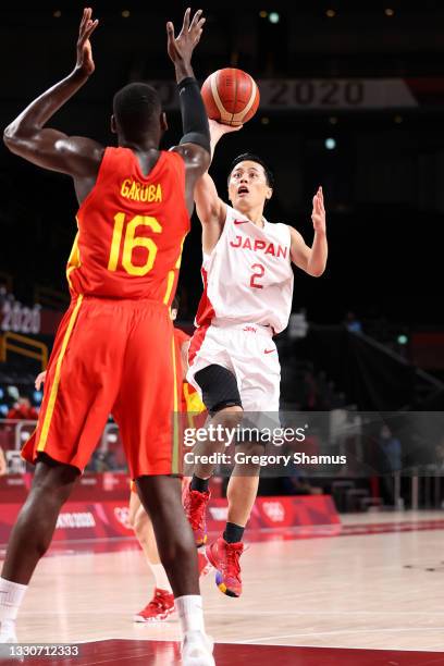 Yuki Togashi of Team Japan shoots a floater in the lane over Usman Garuba of Team Spain during the first half of the Men's Preliminary Round Group C...