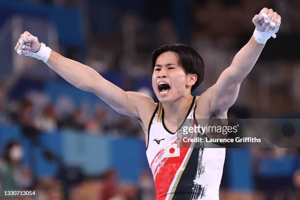 Kazuma Kaya of Team Japan reacts after competing on horizontal bar during the Men's Team Final on day three of the Tokyo 2020 Olympic Games at Ariake...