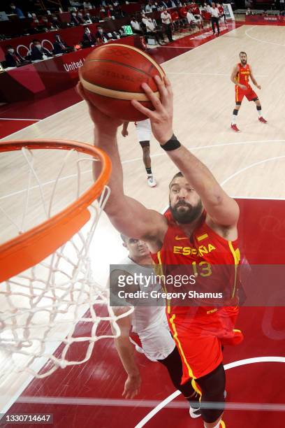 Marc Gasol of Team Spain dunks the ball against Japan during the first half of the Men's Preliminary Round Group C game on day three of the Tokyo...