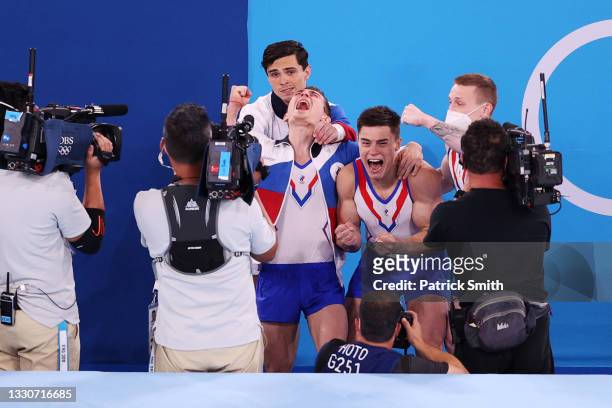 Team ROC celebrates after winning gold the Men's Team Final on day three of the Tokyo 2020 Olympic Games at Ariake Gymnastics Centre on July 26, 2021...