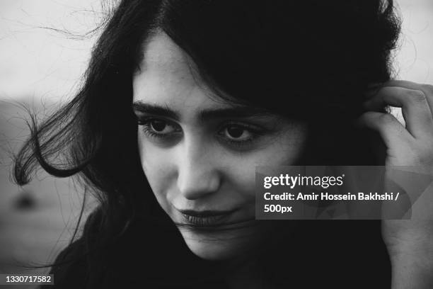 close-up of thoughtful young woman,iran - iranian woman stock-fotos und bilder