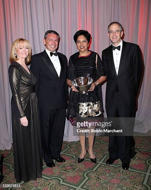 Peggy Conlon, Andrew Robertson, Indra K. Nooyi and Brian Roberts attend the 58th annual Ad Council dinner at the Waldorf Astoria Hotel on November...