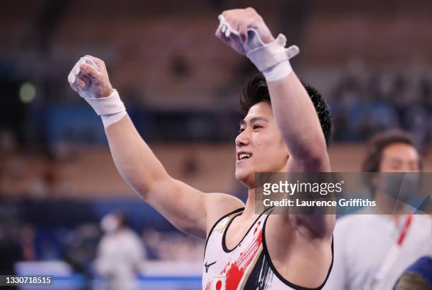 Daiki Hashimoto of Team Japan reacts after competing on horizontal bar during the Men's Team Final on day three of the Tokyo 2020 Olympic Games at...