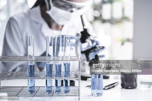 close-up of scientist working in laboratory - new discovery stock pictures, royalty-free photos & images