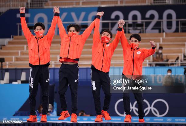 Daiki Hashimoto, Kazuma Kaya, Takeru Kitazono, and Wataru Tanigawa of Team Japan react during the medal ceremony after winning the silver medal in...