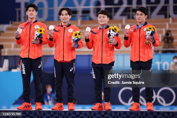 Daiki Hashimoto, Kazuma Kaya, Takeru Kitazono, and Wataru Tanigawa of Team Japan pose with the silver medal during the medal ceremony after the Men's...