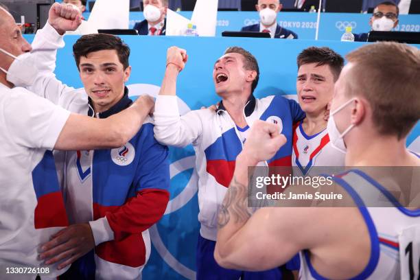 Artur Dalaloyan, David Belyavskiy, Nikita Nagornyy and Denis Abliazin of Team ROC react after winning the gold medal in the Men's Team Final on day...