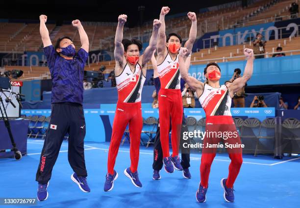 Team Japan reacts after winning the silver medal in the Men's Team Final on day three of the Tokyo 2020 Olympic Games at Ariake Gymnastics Centre on...