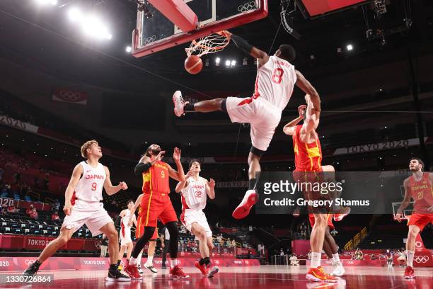 Rui Hachimura of Team Japan dunks the ball against Spain during the first half of the Men's Preliminary Round Group C game on day three of the Tokyo...