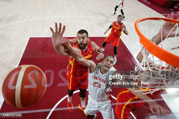 Gavin Earl Edwards of Team Japan drives to the basket against Marc Gasol of Team Spain during the first half of the Men's Preliminary Round Group C...