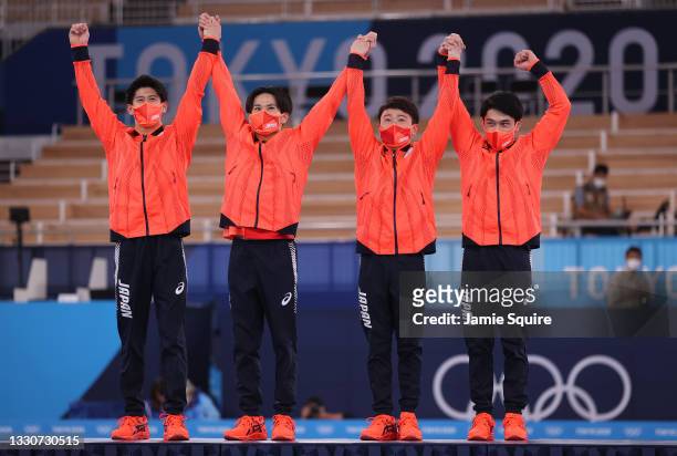 Daiki Hashimoto, Kazuma Kaya, Takeru Kitazono, and Wataru Tanigawa of Team Japan react during the medal ceremony after winning the silver medal in...