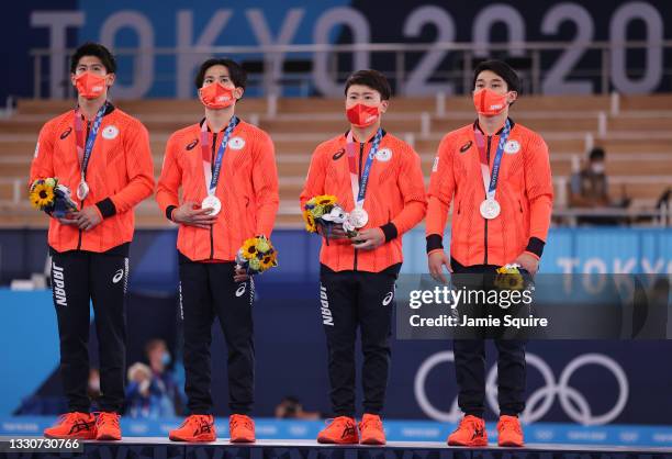 Daiki Hashimoto, Kazuma Kaya, Takeru Kitazono, and Wataru Tanigawa of Team Japan look on during the medal ceremony after winning the silver medal in...