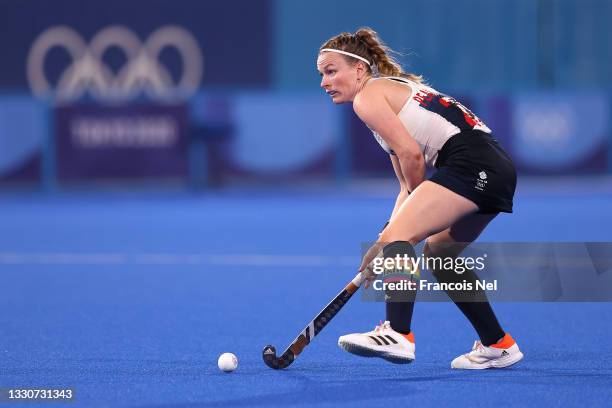 Hollie Pearne-Webb of Team Great Britain controls the ball during the Women's Preliminary Pool A match between South Africa and Great Britain on day...