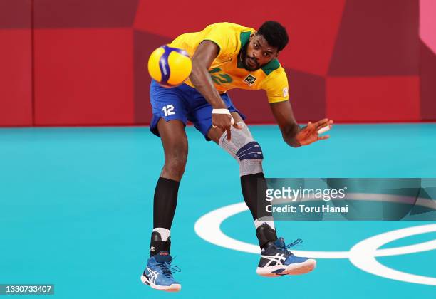 Isac Santos of Team Brazil serves against Team Argentina during the Men's Preliminary Round - Pool B volleyball on day three of the Tokyo 2020...