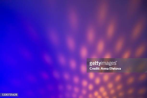 blurred colorful neon background with abstract shadows and lights pattern. copy space for your design. trendy colors of the year. - purple texture foto e immagini stock