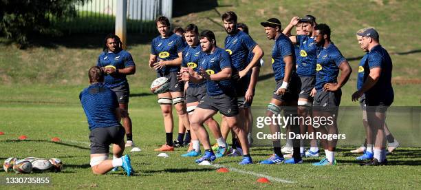 The South Africa forwards warm up during the South Africa Springbok training held at the Western Province High Performance Centre on July 26, 2021 in...