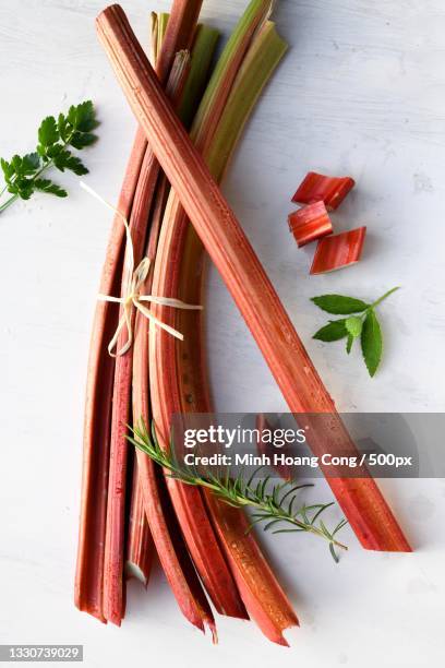 high angle view of rhubarb on table,france - ルバーブ ストックフォトと画像