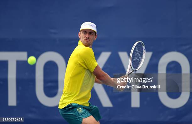 John Millman of Team Australiaplays a backhand during his Men's Singles Second Round match against Alejandro Davidovich Fokina of Team Spain on day...