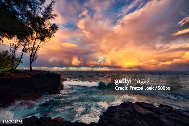 scenic view of sea against sky during sunset,hilo,hawaii,united states,usa - hilo stock pictures, royalty-free photos & images